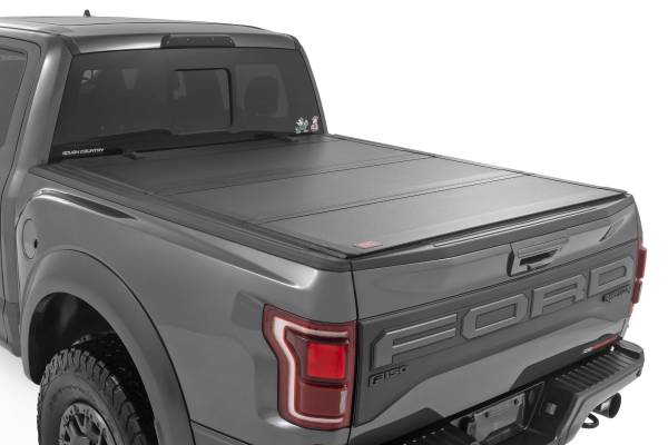 Rough Country - Rough Country - Hard Tri-Fold Flip Up Bed Cover - 6'7" Bed - Ford F-150 2WD/4WD (2021-2026) - 49225650 - Image 1