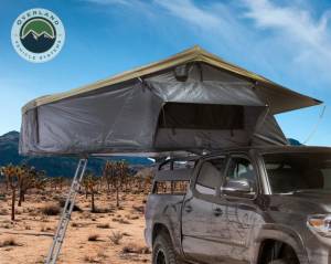 Overland Vehicle Systems - Overland Vehicle Systems Roof Top Tent 3 Person Extended Roof Top Tent Dark Gray Base With Green Rain Fly With Bonus Pack Nomadic - 18039936 - Image 1