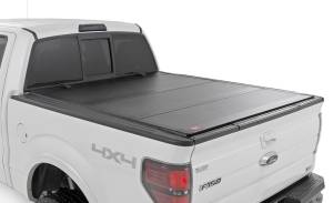Rough Country - Hard Tri-Fold Flip Up Bed Cover - 5'7 in. Bed - Ford F-150 2WD/4WD (2004-2014) | 49214550 - Image 1
